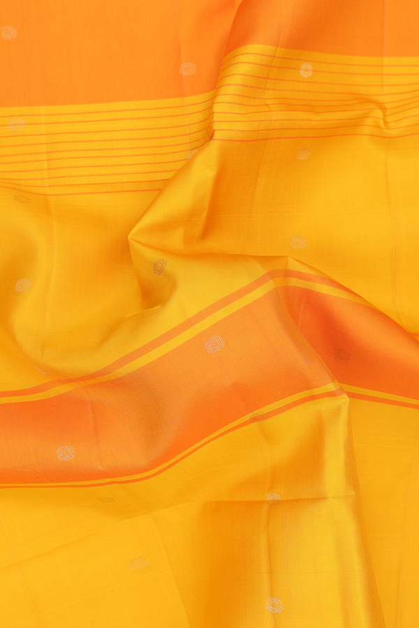 Soft Silk Saree In Shades Of Yellow Along Stripes With Buttas