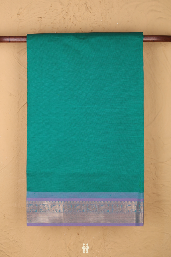Semi Silk Cotton Saree In Teal Blue With Peacock Border