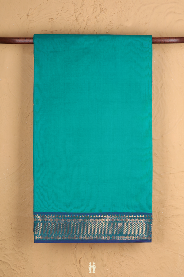Semi Silk Cotton Saree In Peacock Blue With Zari Border