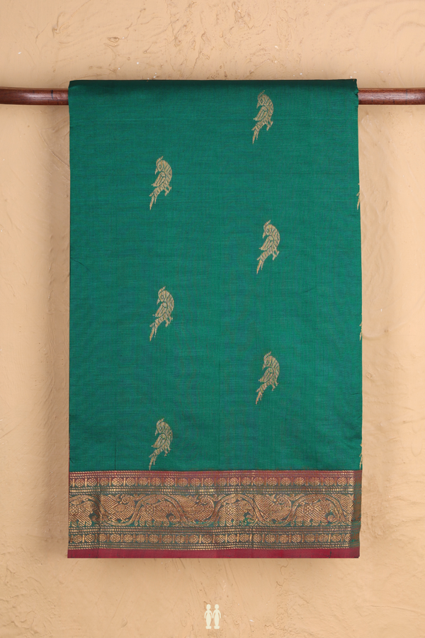 Silk Cotton Saree In Emerald Green With Peacock Buttas