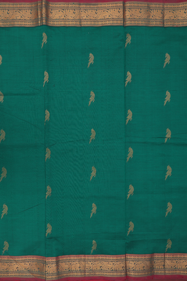 Silk Cotton Saree In Emerald Green With Peacock Buttas
