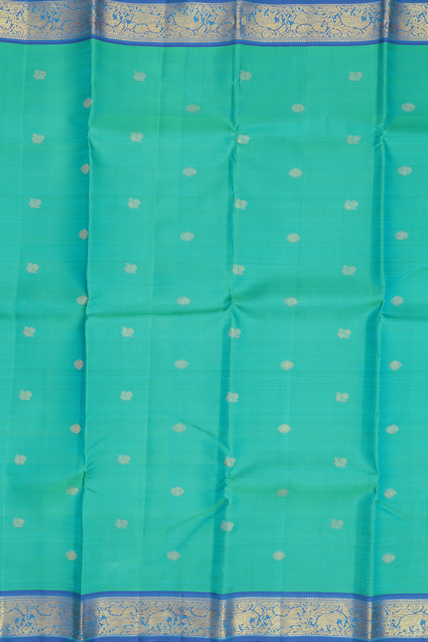 Kanchipuram Silk Saree In Greenish Blue With Peacock Buttas