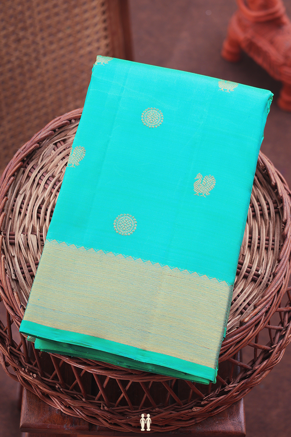 Kanchipuram Silk Saree In Tiffany Blue With Peacock Buttas