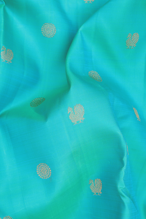 Kanchipuram Silk Saree In Tiffany Blue With Peacock Buttas