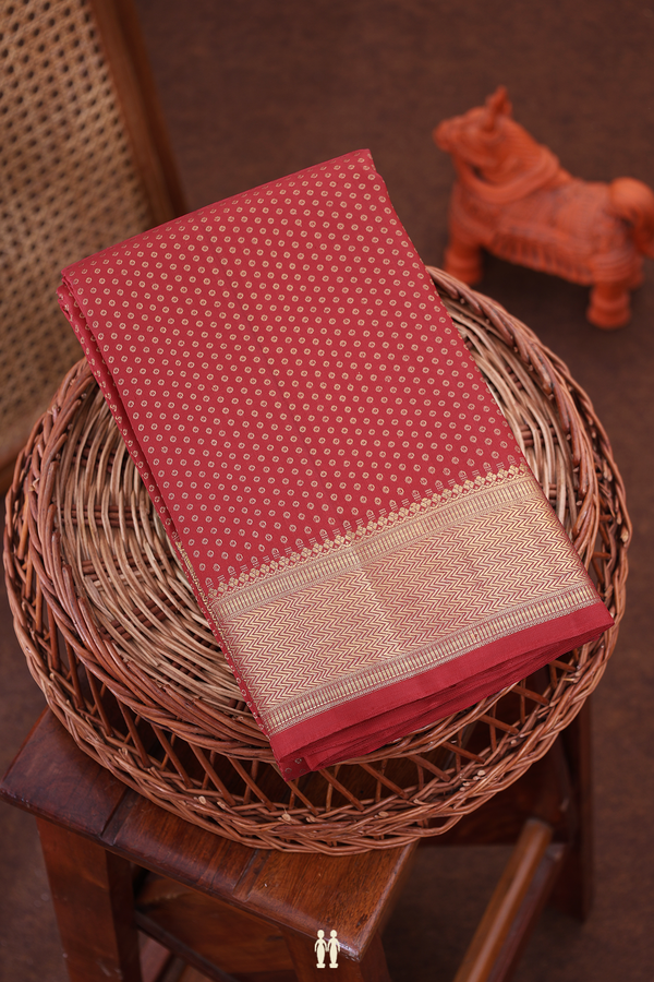 Kanchipuram Silk Saree In Crimson Red With Zari Buttis