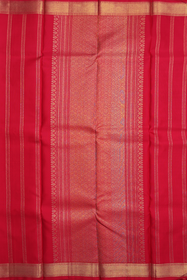 Kanchipuram Silk Saree In Crimson Red With Peacock Buttas
