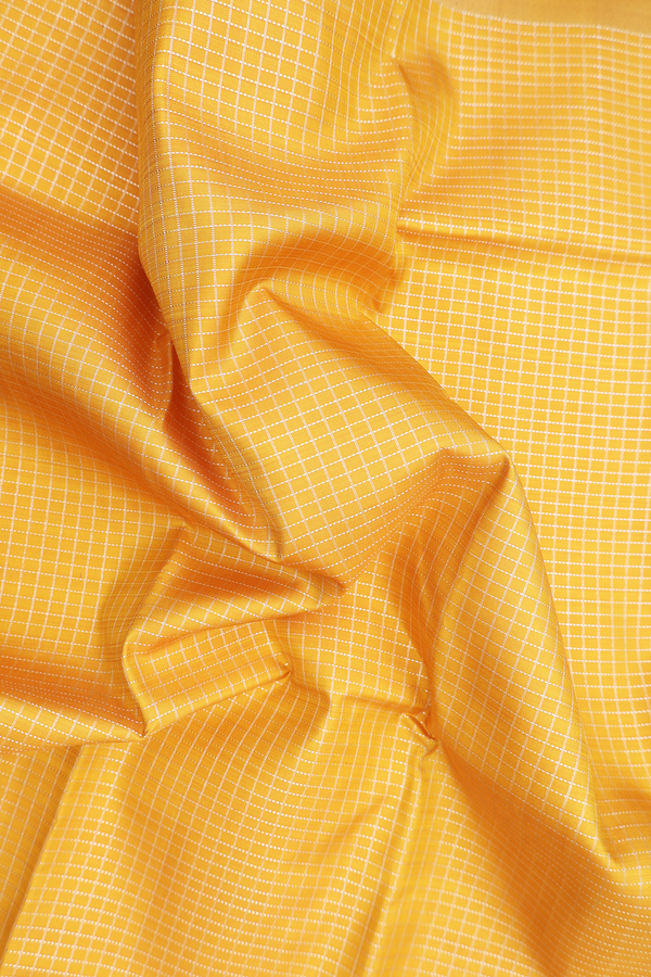 Kanchipuram Silk Saree In Saffron Yellow With Checks Design