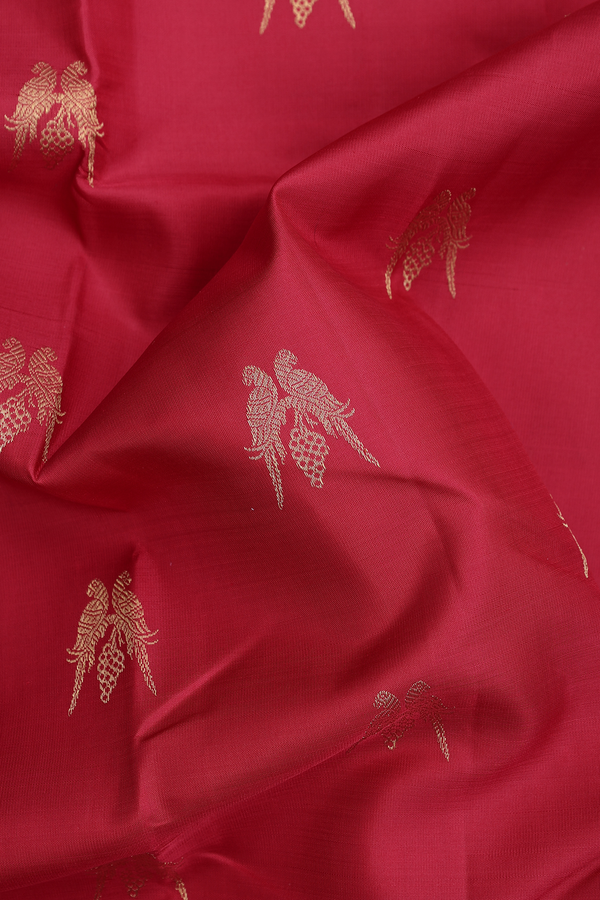 Kanchipuram Silk Saree In Red With Parrot Buttas