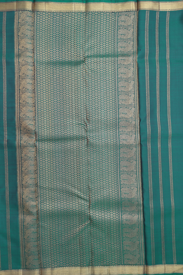 Kanchipuram Silk Saree In Peacock Green With Zari Buttas