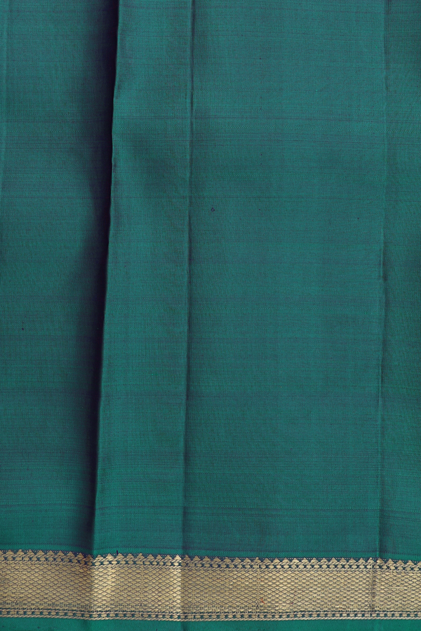 Kanchipuram Silk Saree In Peacock Green With Zari Buttas