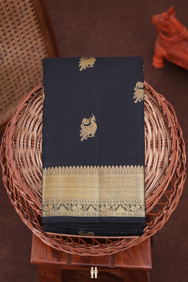 Kanchipuram Silk Saree In Black With Peacock Buttas