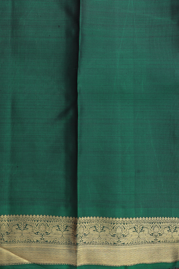 Kanchipuram Silk Saree In Forest Green With Peacock Buttas