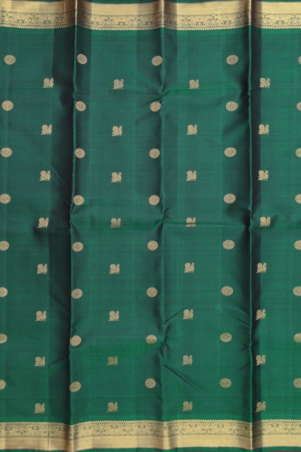 Kanchipuram Silk Saree In Forest Green With Peacock Buttas
