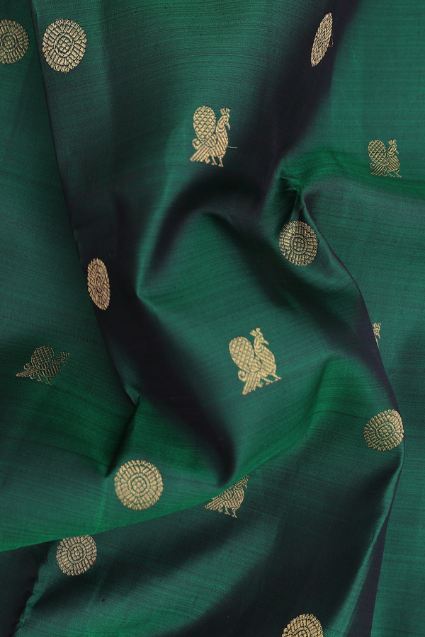 Kanchipuram Silk Saree In Forest Green With Peacock Buttas