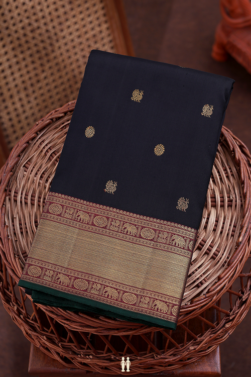 Kanchipuram Silk Saree In Black With Peacock Buttas