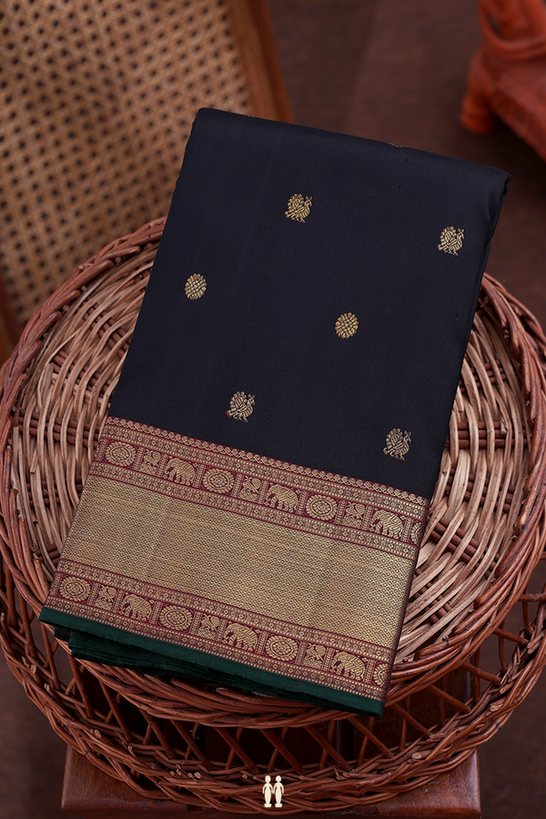 Kanchipuram Silk Saree In Black With Peacock Buttas