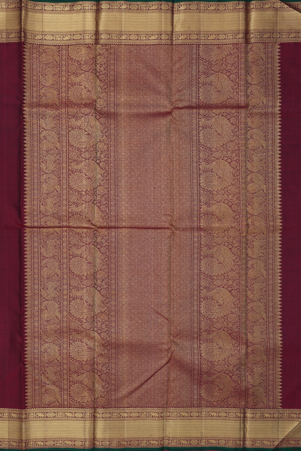Kanchipuram Silk Saree In Black With Peacock Buttas