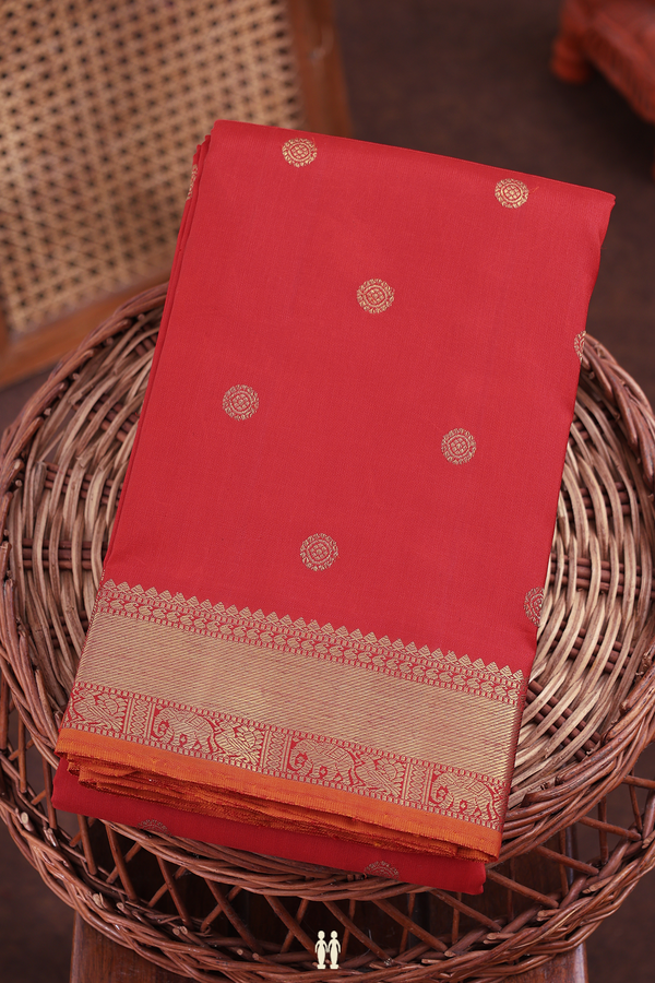 Kanchipuram Silk Saree In Scarlet Red With Chakram Buttas