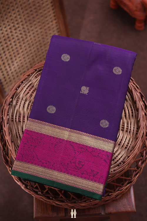 Kanchipuram Silk Saree In Regal Purple With Peacock Buttas