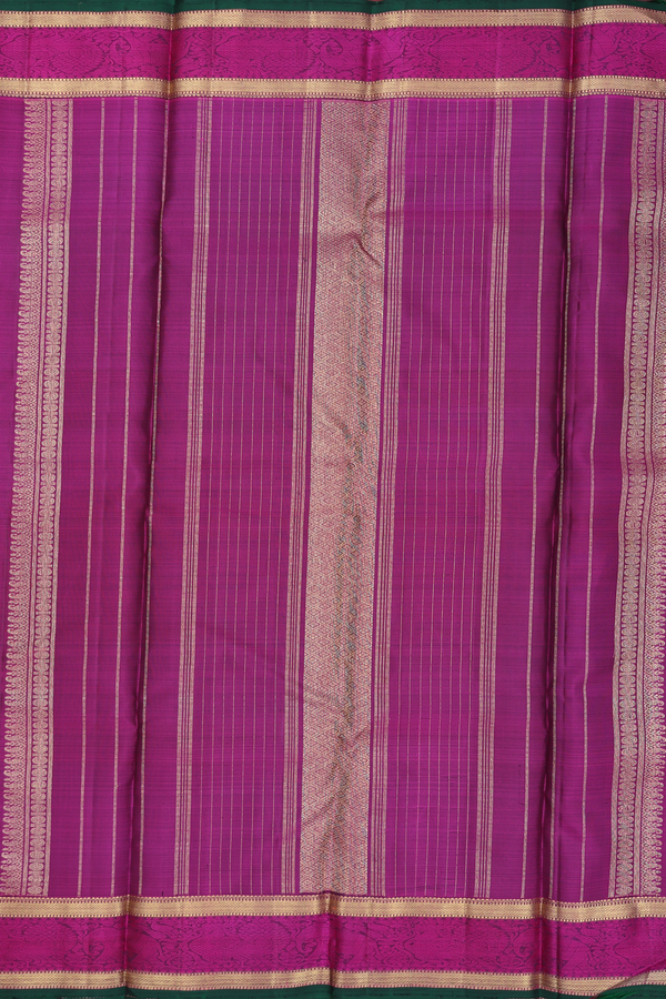 Kanchipuram Silk Saree In Regal Purple With Peacock Buttas