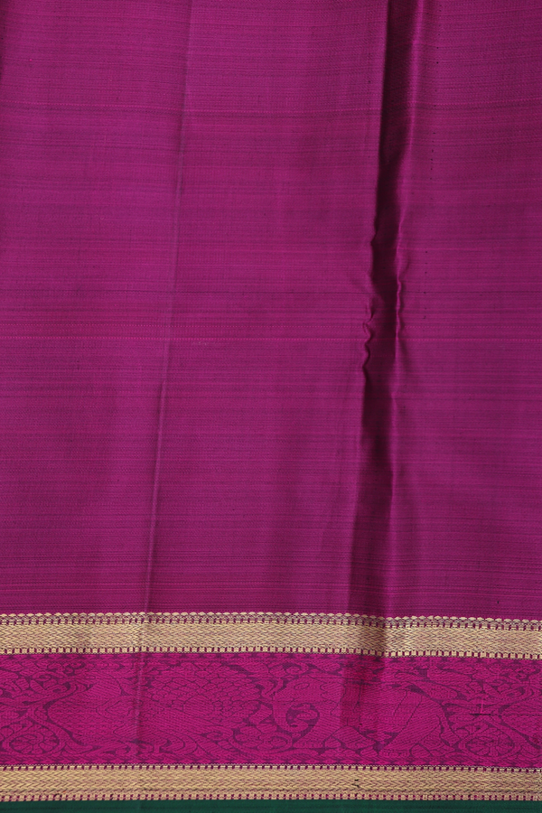 Kanchipuram Silk Saree In Regal Purple With Peacock Buttas
