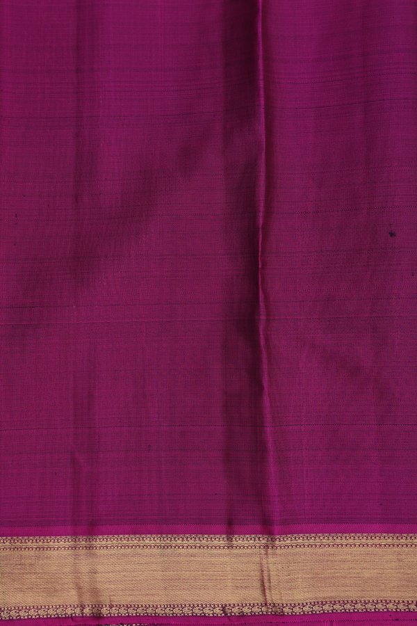 Kanchipuram Silk Saree In Green Along Checks With Buttas