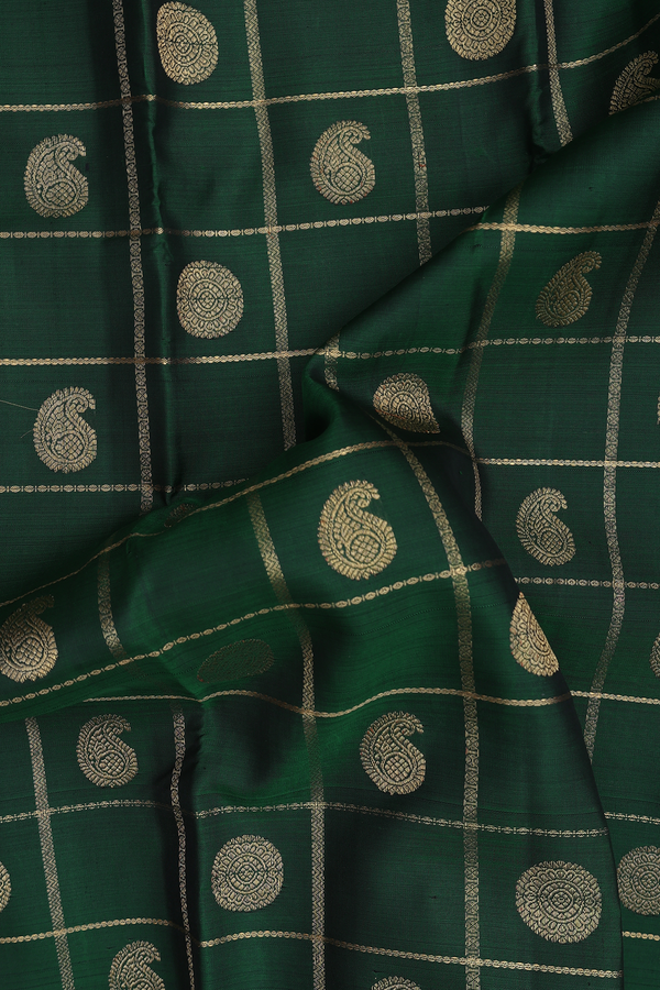 Kanchipuram Silk Saree In Green Along Checks With Buttas