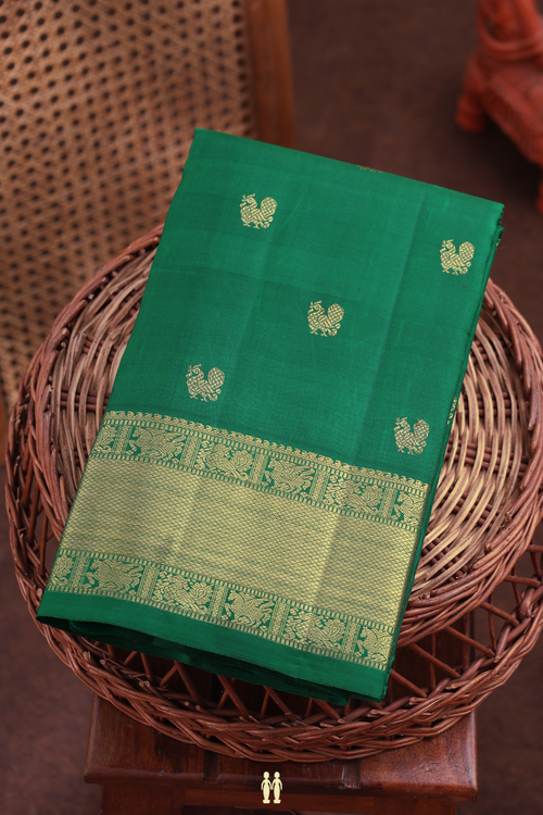 Kanchipuram Silk Saree In Emerald Green With Peacock Buttas