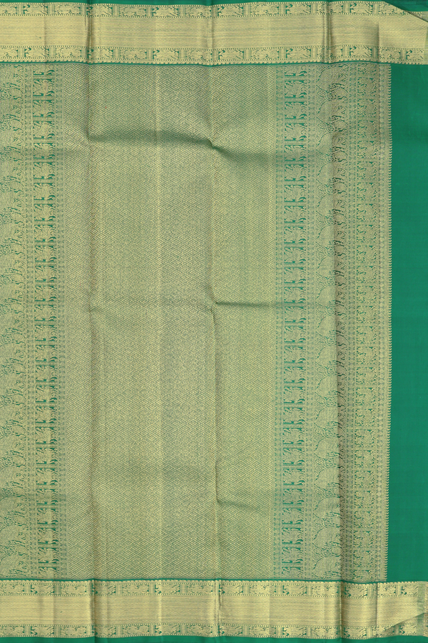 Kanchipuram Silk Saree In Emerald Green With Peacock Buttas