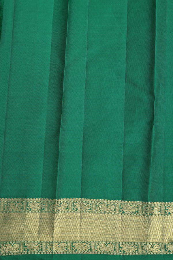 Kanchipuram Silk Saree In Emerald Green With Peacock Buttas