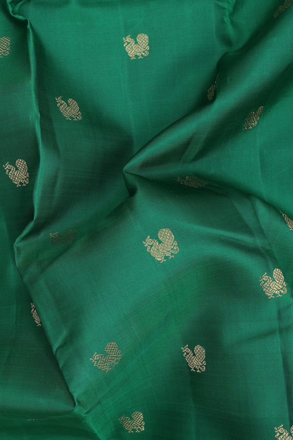 Kanchipuram Silk Saree In Emerald Green With Peacock Buttas