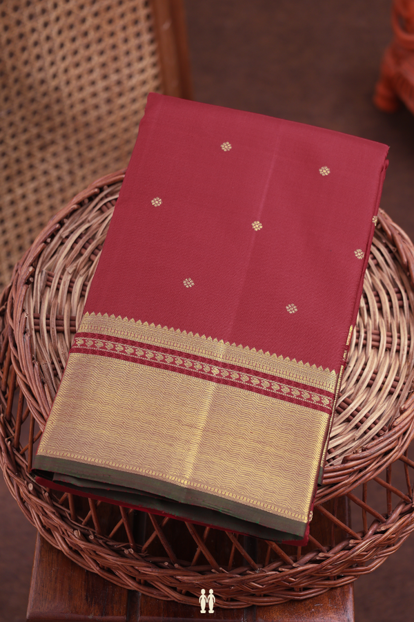 Kanchipuram Silk Saree In Crimson Red With Floral Buttis