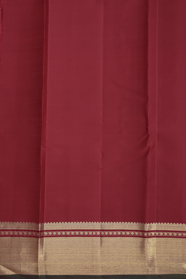 Kanchipuram Silk Saree In Crimson Red With Floral Buttis