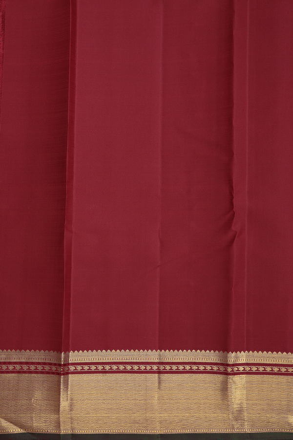 Kanchipuram Silk Saree In Crimson Red With Floral Buttis