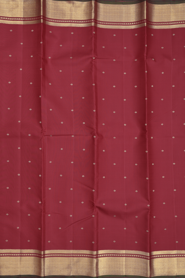 Kanchipuram Silk Saree In Crimson Red With Floral Buttis