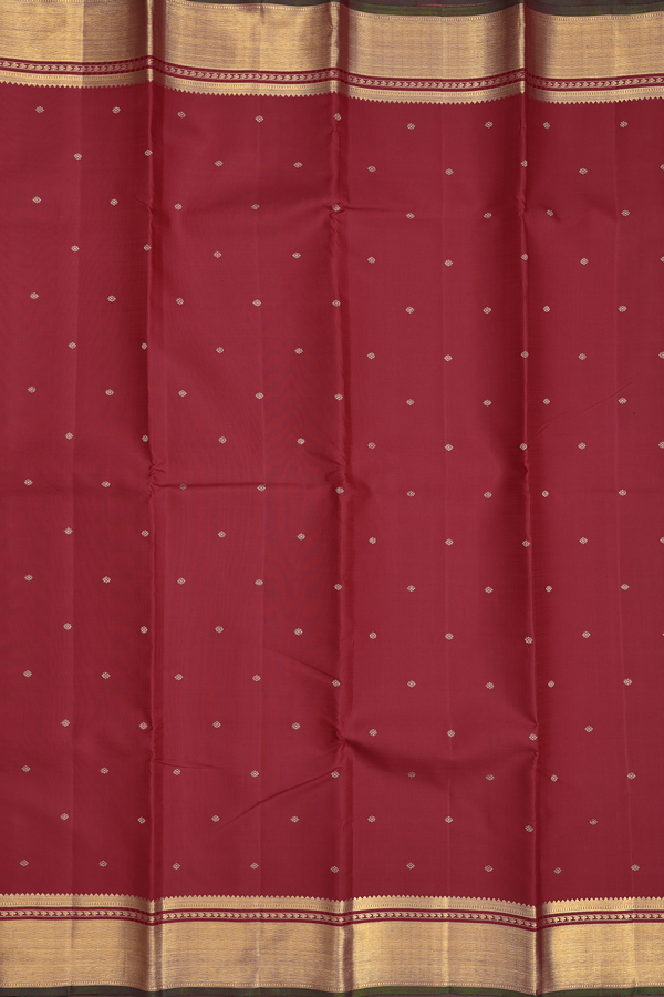 Kanchipuram Silk Saree In Crimson Red With Floral Buttis