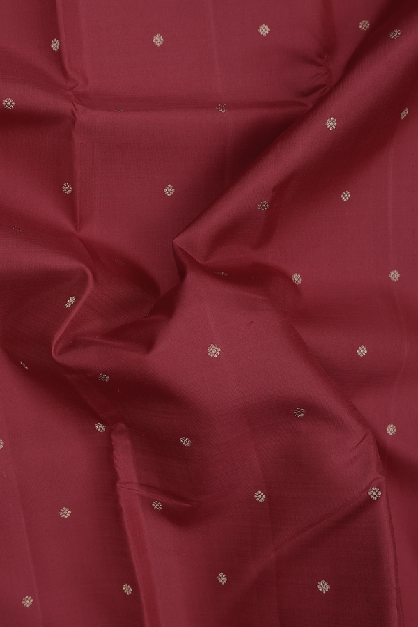 Kanchipuram Silk Saree In Crimson Red With Floral Buttis