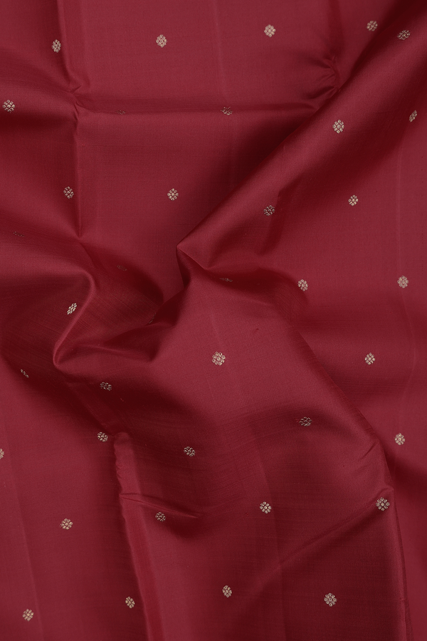 Kanchipuram Silk Saree In Crimson Red With Floral Buttis