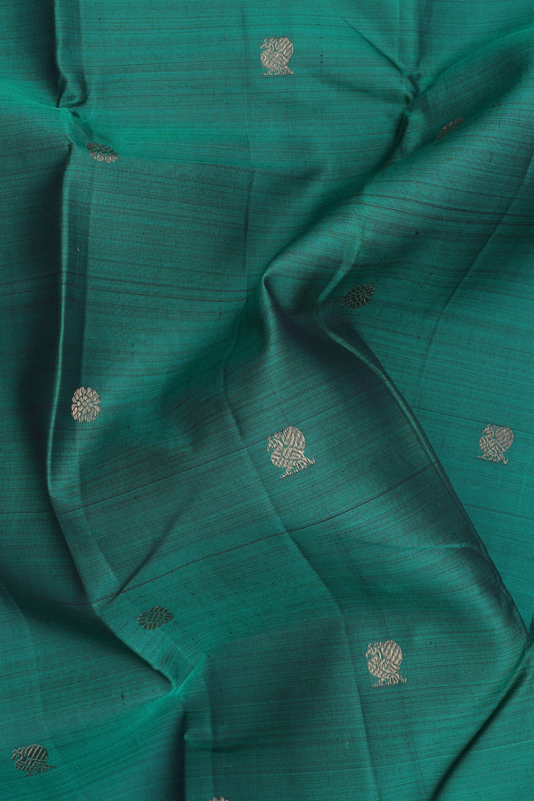 Kanchipuram Silk Saree In Green With Peacock Buttas