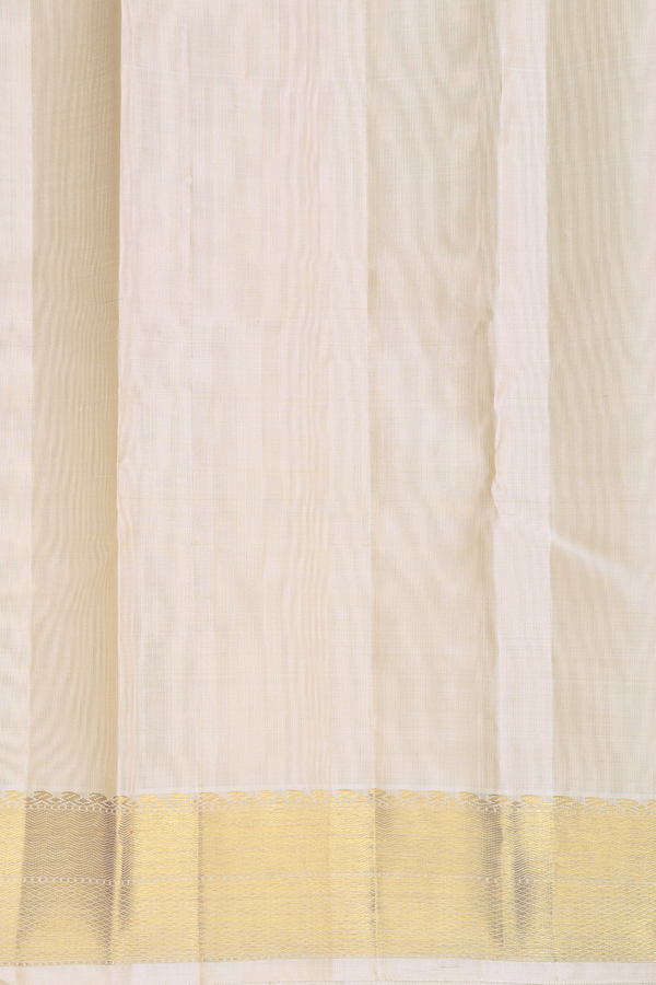 Kanchipuram Silk Saree In Cream Color With Peacock Buttas