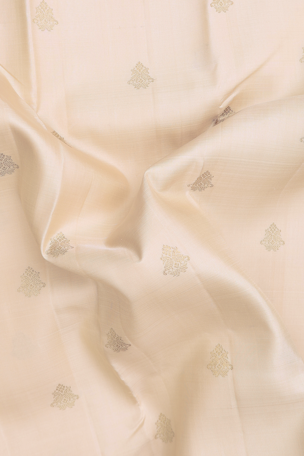 Kanchipuram Silk Saree In Cream Color With Peacock Buttas