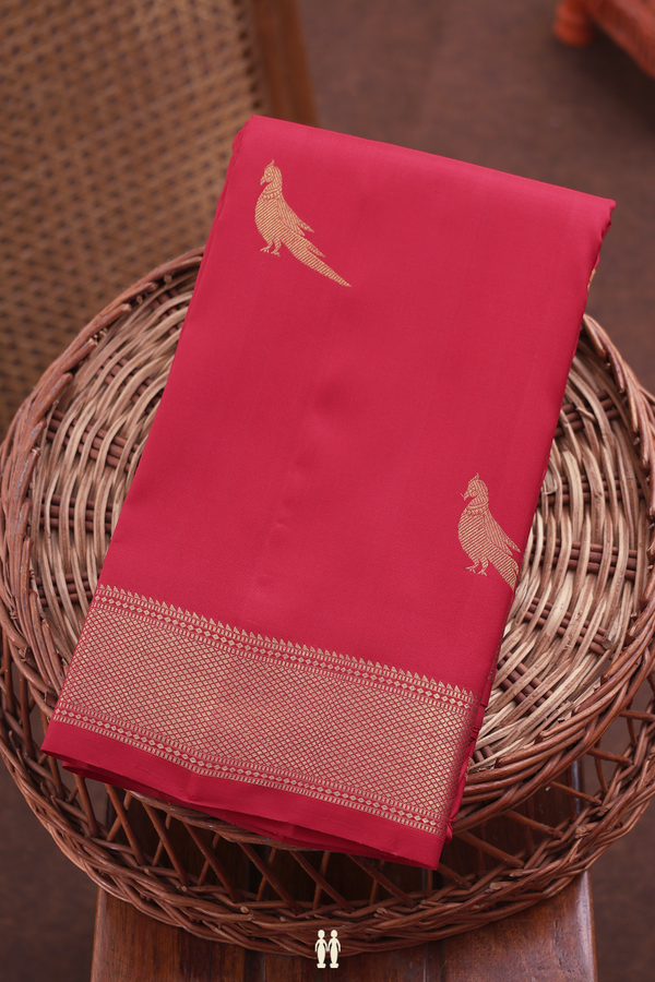 Kanchipuram Silk Saree In Crimson Red With Parrot Buttas