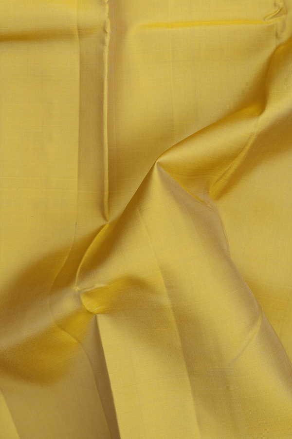 Kanchipuram Silk Saree In Yellow With Threadwork Border
