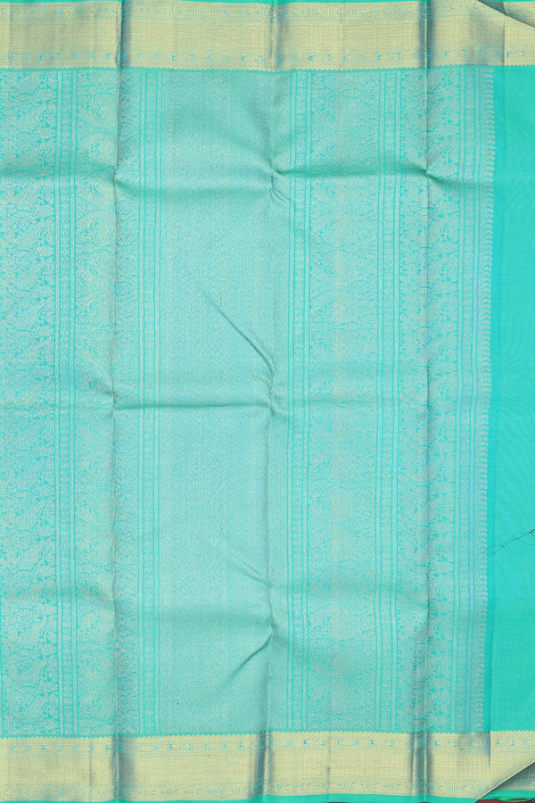 Kanchipuram Silk Saree In Green With Zari Buttas
