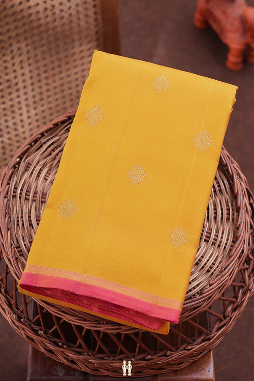 Kanchipuram Silk Saree In Yellow With Kolam Buttas