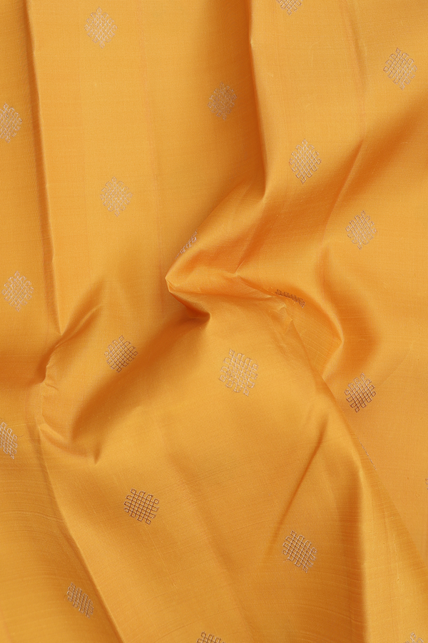 Kanchipuram Silk Saree In Yellow With Kolam Buttas