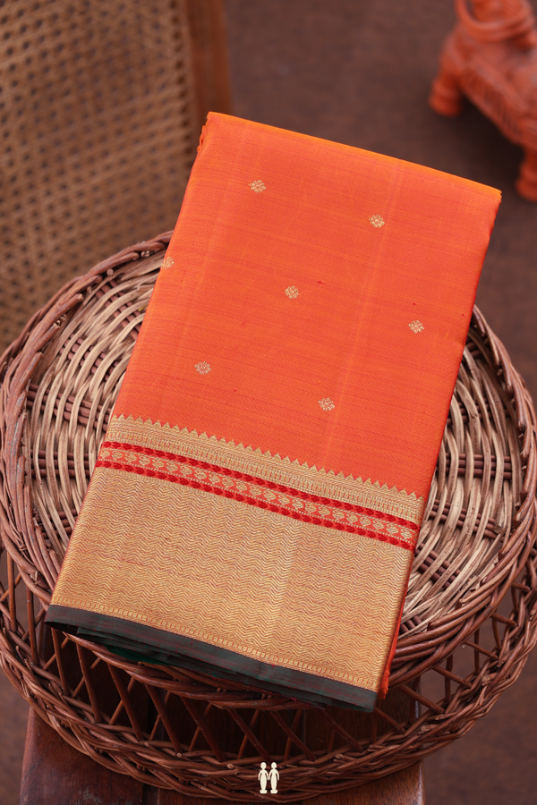 Kanchipuram Silk Saree In Spiced Orange With Floral Buttis