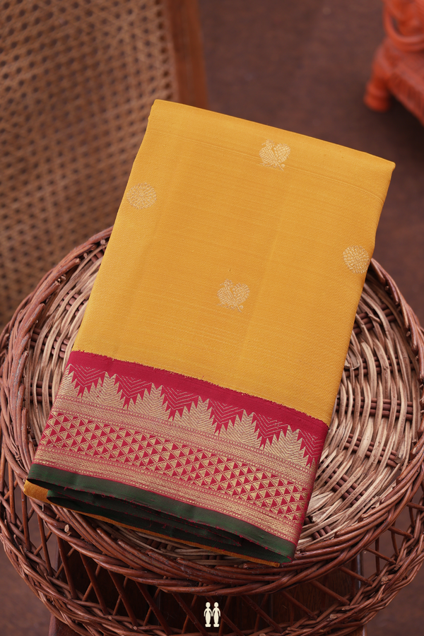 Kanchipuram Silk Saree In Honey Yellow With Peacock Buttas
