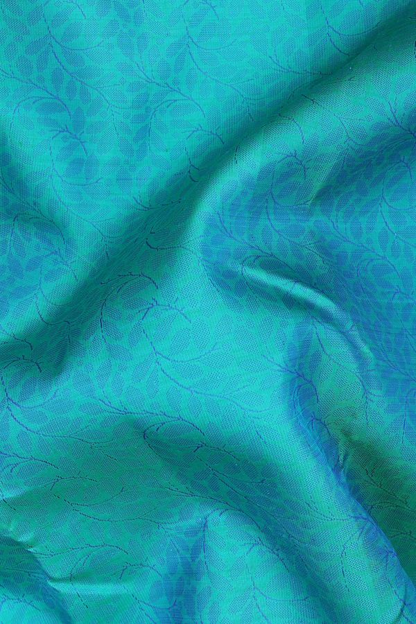 Kanchipuram Silk Saree In Bluish Green With Floral Design