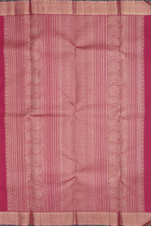 Kanchipuram Silk Saree In Plum Purple With Floral Buttas